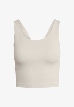 Top corto beige chiaro realizzato in tessuto liscio e elasticizzato. Presenta spalline larghe e un collo a scollo rotondo.