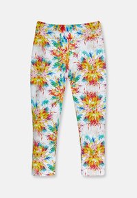Värgglada capri leggings med ett blommönster i rött, gult, blått och grönt på en vit bakgrund. Tillverkade av mjukt, stretchigt tyg.