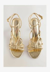 Geselecteerd, gold-couloured