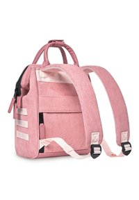 Pink corduroy backpack with padded straps, a top handle, a front zippered pocket, and white accent straps. Compact and textured design.
