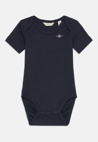Body en coton bleu marine à manches courtes, avec un col rond et une fermeture à pression à l'arrière. Il présente un petit logo brodé sur la poitrine.