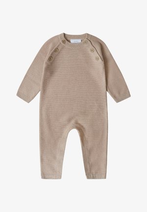 Beige gebreid onesie met lange mouwen, ronde hals en knoopdetails op de schouder. Vlotte textuur en geribbelde manchetten.