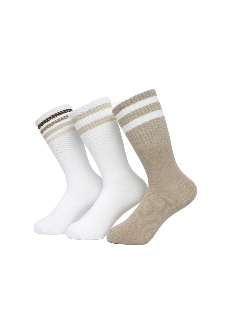 Tre paia di calzini: uno bianco con righe marroni, uno completamente bianco e uno beige con righe bianche. Realizzati in cotone con una texture a costine.