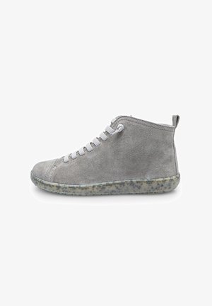 Gray suede ankle boots with a textured rubber sole, featuring white laces and a pull tab at the back for easy wear.