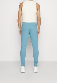 PS Paul Smith Teplákové kalhoty - light blue