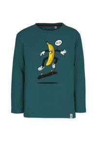 Teal långärmad tröja med en tecknad banan som åker skateboard och ordet "FLIP" i en pratbubbla. Tillverkad i bomull, avslappnad design.