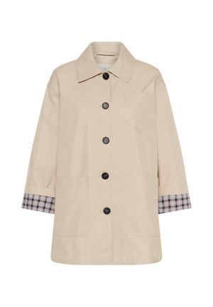 Manteau beige à boutons avec col, trois poches avant et doublure à carreaux aux poignets des manches longues.