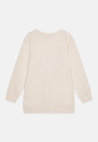 Felpa beige chiaro realizzata in tessuto morbido, con maniche lunghe, scollo rotondo e polsini e orlo a coste. Texture liscia, colore uniforme.