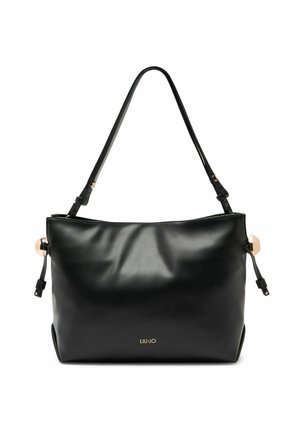 Sac à main en cuir noir à texture lisse, doté de deux bretelles d'épaule, d'accents dorés et d'un logo discrètement embossé sur le devant.