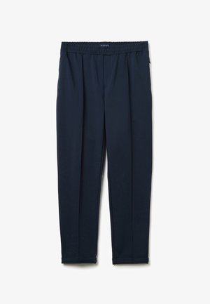 Marinefarbene Hose mit elastischem Bund, glatter Textur, schmal zulaufendem Bein und einem umgeschlagenen Saum. Mit vorderen Falten für zusätzliche Details.