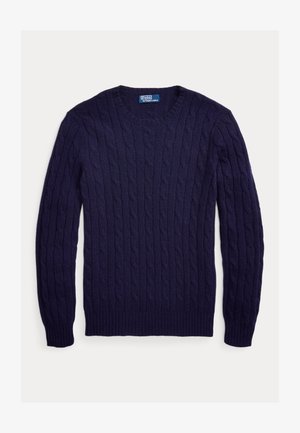 Tamsiai mėlynas megztinis su pynimo raštu, apvalia apykakle, dekoruotas tekstūrinėmis detalėmis, su riboto audinio rankogaliais ir apačia. Pagamintas iš minkštos, storos megztos medžiagos.