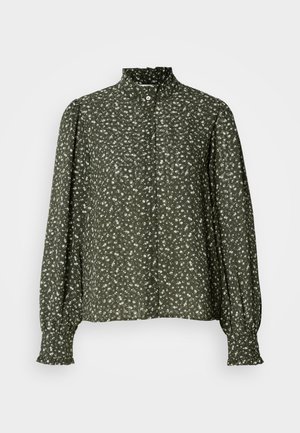 Tamsiai žalia gėlėmis marginta palaidinė su aukštu apykaklės, mygtukų priekyje ir ilgomis sijonų rankovėmis su elastiniais raišteliais. Minkšta, lengva audinio tekstūra.