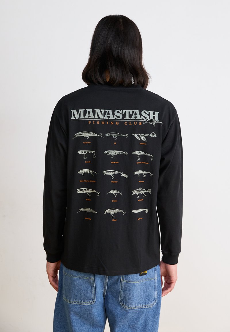 Black long-sleeve shirt featuring "MANASTASH FISHING CLUB" text and illustrations of fishing lures in various shapes and colors on the back.