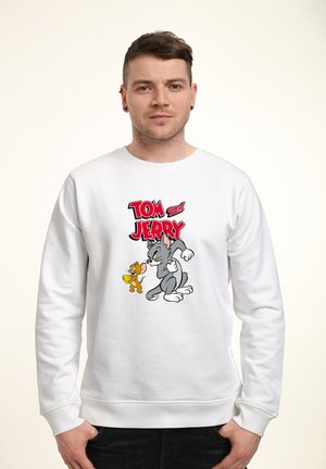 Bílá mikina s barevným potiskem Tom a Jerry. Design zvýrazňuje kreslené postavičky s výraznými černými konturami a jasnými barvami.