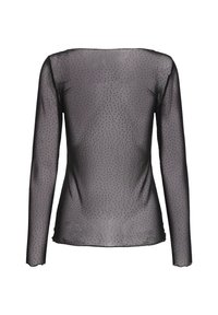 Top long-sleeve trasparente nero con motivo a pois su tutta la superficie, scollo rotondo e vestibilità aderente. Tessuto morbido e leggero con una consistenza liscia.
