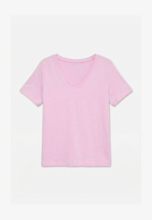 Jasnoróżowa koszulka z krótkim rękawem i dekoltem w serek, ułożona płasko na białym tle, pokazująca przód i prosty wzór.