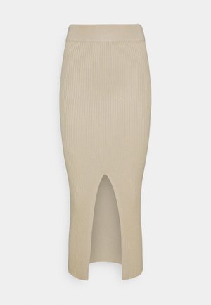 Jupe midi beige en maille avec texture côtelée, coupe ajustée et une fente haute à l'avant pour plus de détails. Taille lisse.