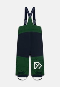 Insulated bib overalls in dark green and navy blue. Features adjustable straps, elastic cuffs, and a reflective logo on the lower leg.