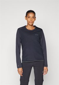 Zwarte sweatshirt met lange mouwen en een ronde hals, zijzakken en contrasterende accenten. Gemaakt van zachte, rekbare stof voor optimaal comfort.
