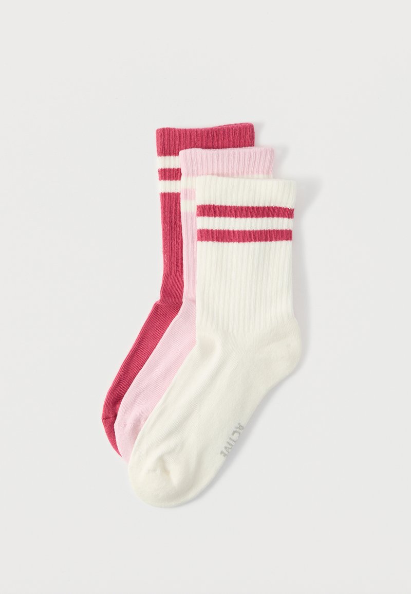 Three pairs of ribbed socks: dark pink, light pink, and cream with red and white stripes at the top. Soft cotton blend material.