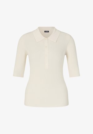 Crème ribbelgebreide polo-shirt met halve mouwen en een drieknoopsluiting, aansluitende silhouet en een klassieke kraag.