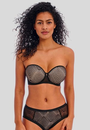 Zwarte en grijze gestreepte strapless beha met een gladde afwerking, featuring een gestructureerde vorm en een detail met hardware in het midden vooraan.