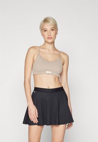 Björn Borg STUDIO SEAMLESS STRAP BRA - Sujetadores deportivos con sujeción ligera - etherea