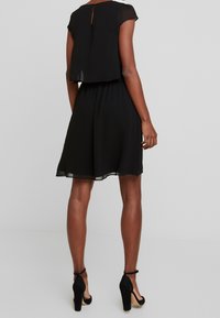 NAF NAF Cocktailklänning - black