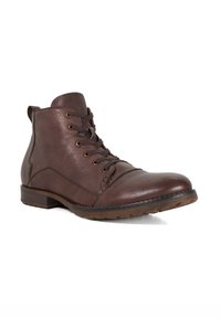 Brown leather ankle boots with a smooth texture, round toe, and six eyelets. Features a low heel and a rubber sole for traction.
