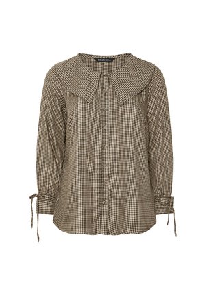 Brązowa i kremowa bluzka w kratę z dużym kołnierzem, z przodu na guziki i z wiązanymi rękawami. Wykonana z tkaniny tkanej o teksturowanym wykończeniu.
