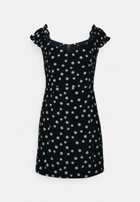 Schwarzes Kleid mit weißen Punkten, kurzen Puffärmeln, rundem Ausschnitt und figurbetonter Silhouette. Besitzt einen Reißverschluss auf der Rückseite.