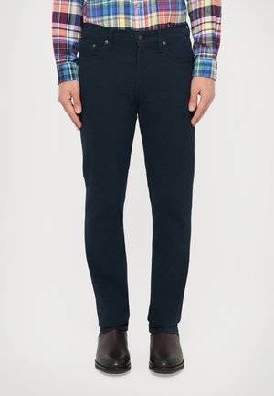 - Jeansy Slim Fit