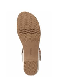 Semelle de sandale en caoutchouc brun texturé, arborant des motifs ondulés. Comprend une partie supérieure blanche avec une touche de brun clair.