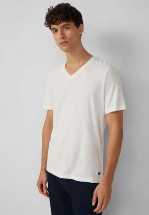V-hals, T-shirt met korte mouwen in gebroken wit, gemaakt van textuurstof, met een klein logo-detail aan de zoom.