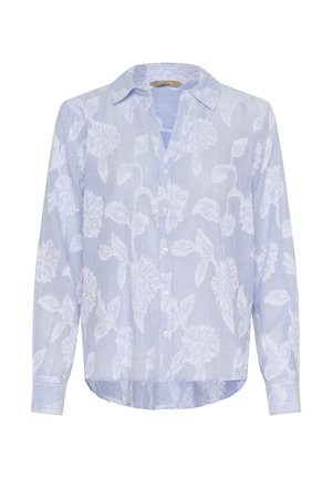 Gaiši zila blūze ar vertikālām baltām svītrām un ziedu rakstiem. Aprīkota ar apkakli, pogām un garām piedurknēm. Gluda auduma tekstūra.