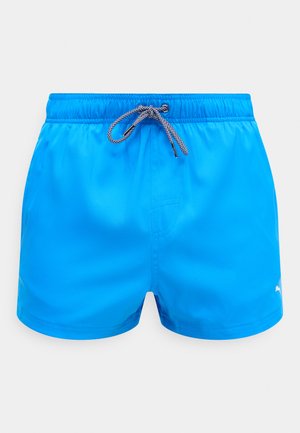 Lyseblå herrebadeshorts med elastisk midje og svart-hvitt snor, vist mot en hvit bakgrunn.