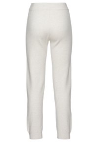 Light grey, soft fabric joggers with a tapered fit, elastic waistband, and ribbed cuffs. No visible pockets or embellishments.