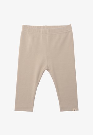 Beige ribbed leggings with an elastic waistband, featuring a small brand label on the lower left side. Smooth texture and fitted design.