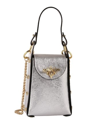 Small silver metallic handbag with top handle, gold bee decoration on flap, and gold chain strap on the side.