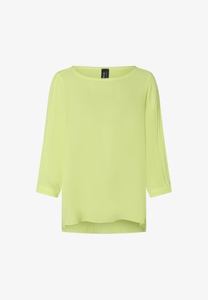 Limonengrüne Bluse mit U-Ausschnitt und Dreiviertelärmeln. Hergestellt aus leichtem Stoff, mit lockerem Schnitt und seitlichen Schlitzen.