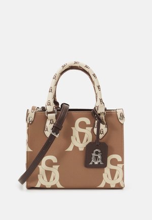 Brown and beige handbag with a large "SA" logo pattern, cream handles with smaller logos, and a dark brown adjustable shoulder strap and tag.