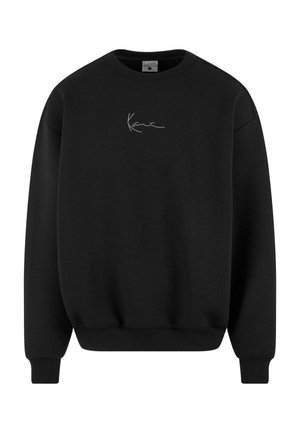 Czarna bluza wykonana z miękkiego materiału, z okrągłym dekoltem i długimi rękawami. Z przodu znajduje się proste, dyskretne haftowane logo.