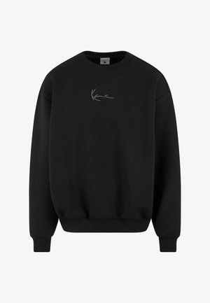 Sort sweatshirt lavet af blødt stof, med rund hals og lange ærmer. Den har et enkelt, diskret broderet logo foran.