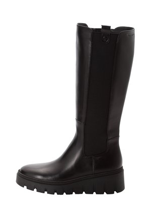 Black mid-calf leather boot with thick treaded sole and elastic side panel for easy wear, viewed from the outer side.
