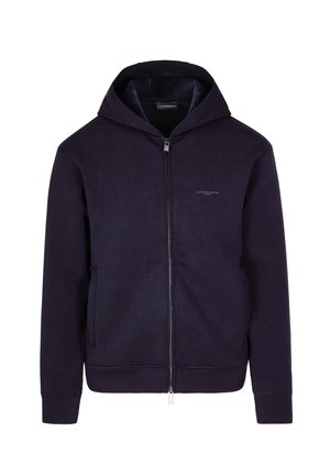 Felpa navy con zip e cappuccio regolabile, tasche frontali e polsini a costine. Materiale in morbido cotone misto con un sottile motivo texturizzato.