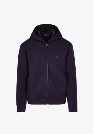Felpa navy con zip e cappuccio regolabile, tasche frontali e polsini a costine. Materiale in morbido cotone misto con un sottile motivo texturizzato.