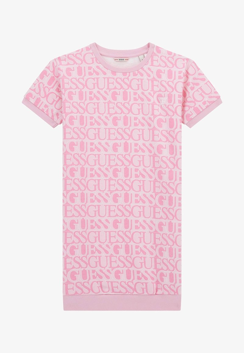 Abito t-shirt rosa con motivo ripetuto del logo "GUESS", maniche corte, colletto tondo, polsini a coste e orlo dritto. Materiale in cotone morbido.