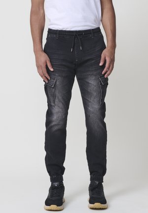 JOGGER  - Vaqueros tapered - black denim