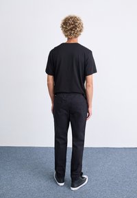 Champion Rochester - Spodnie materiałowe