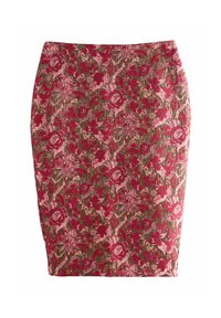 Jupe crayon florale en tissu texturé avec de grandes fleurs rouges et roses sur un fond vert foncé, design ajusté.